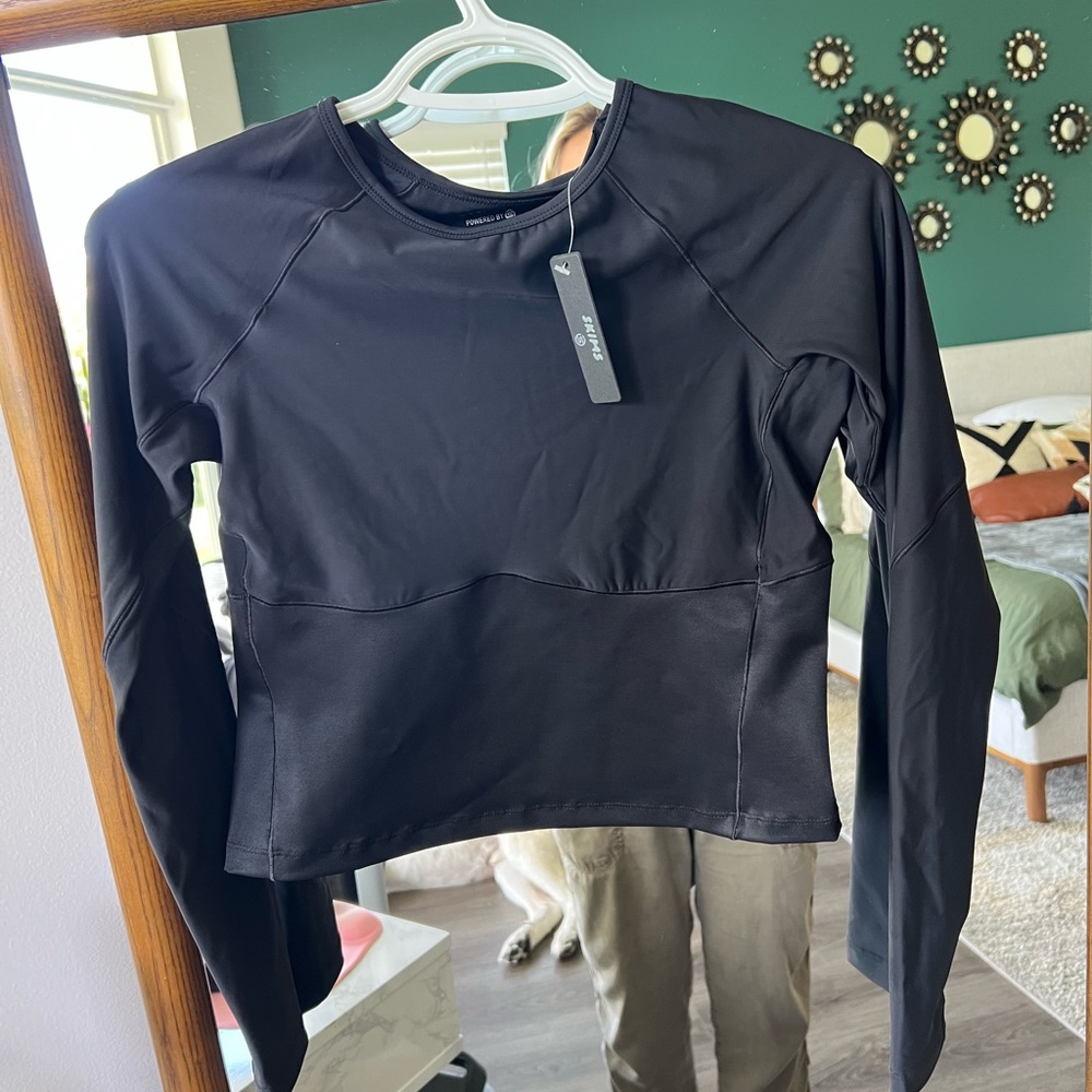 SKIMS athletic shirt